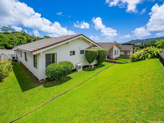 45-812 Kupohu St, Kaneohe, HI 96744 - back of house with a tiled roof, stucco siding, and a mountain view