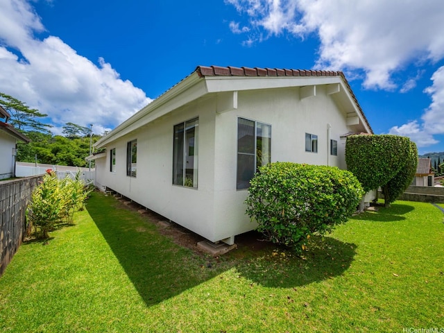 45-812 Kupohu St, Kaneohe, HI 96744 - view of side of property featuring stucco siding