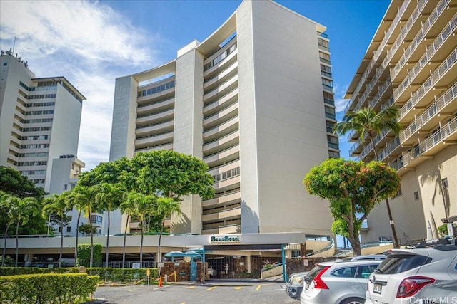 2877 Kalakaua Ave Unit 305, Honolulu, HI 96815 - view of building exterior featuring uncovered parking