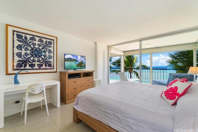 2877 Kalakaua Ave Unit 306, Honolulu, HI 96815 - bedroom with access to outside and light tile patterned flooring