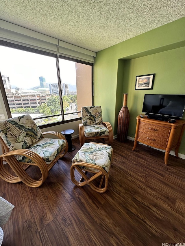 1778 Ala Moana Blvd Unit 905, Honolulu, HI 96815 - sitting room with a textured ceiling and wood finished floors