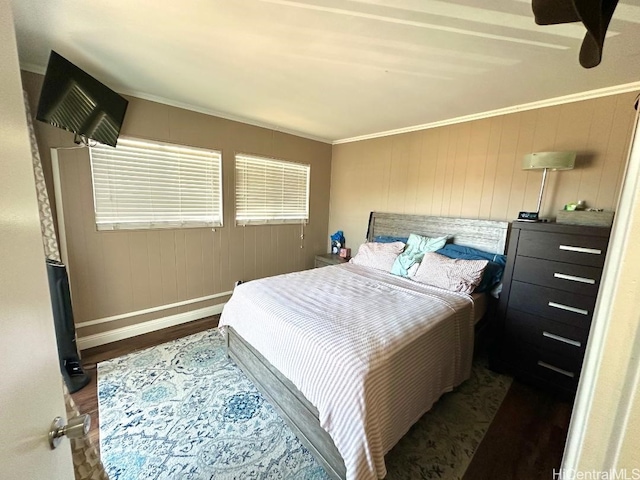 1023 Kapahulu Ave Unit 1, Honolulu, HI 96816 - bedroom with wood finished floors, crown molding, baseboards, wooden walls, and ceiling fan