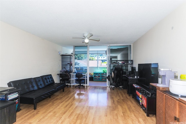 1718 Anapuni St Unit 205, Honolulu, HI 96822 - living area with ceiling fan, light wood finished floors, and an office area