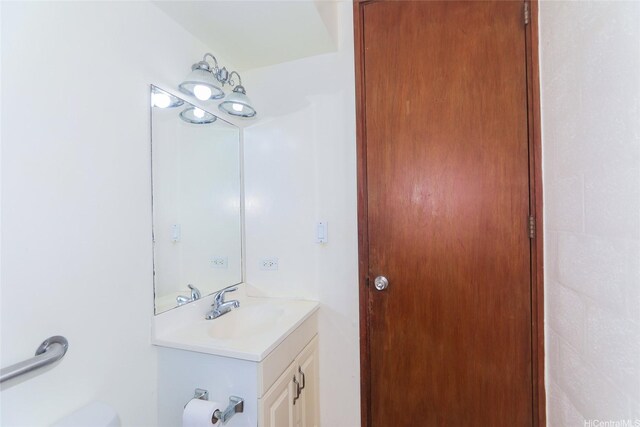 1718 Anapuni St Unit 205, Honolulu, HI 96822 - bathroom featuring vanity and toilet