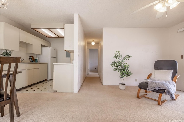 94-1064 Paawalu St Unit N1, Waipahu, HI 96797 - living area featuring light colored carpet and ceiling fan