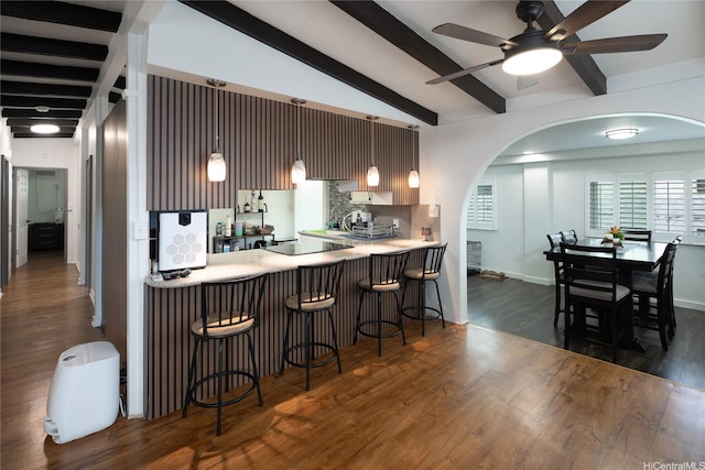 2283 Anapanapa St, Pearl City, HI 96782 - kitchen featuring arched walkways, dark wood-style floors, a ceiling fan, and beam ceiling