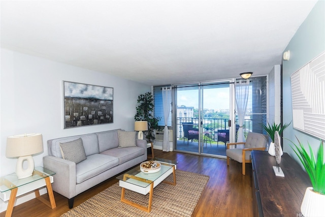 1541 Dominis St Unit 1601, Honolulu, HI 96822 - living area featuring wood finished floors, a wall of windows, and baseboards