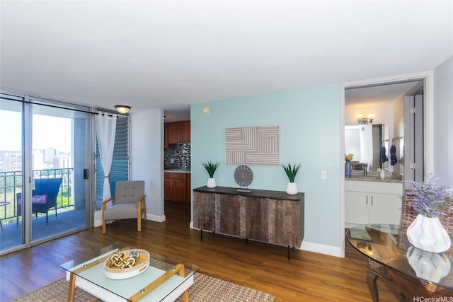 1541 Dominis St Unit 1601, Honolulu, HI 96822 - living room featuring dark wood-style floors and baseboards