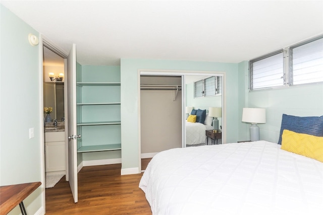 1541 Dominis St Unit 1601, Honolulu, HI 96822 - bedroom with wood finished floors, a closet, and baseboards
