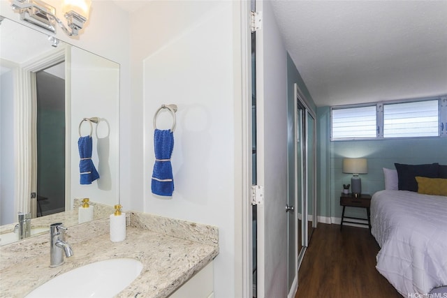1541 Dominis St Unit 1601, Honolulu, HI 96822 - bathroom with wood finished floors and vanity