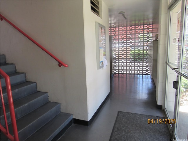 1670 Kalakaua Ave Unit 603, Honolulu, HI 96826 - hallway featuring stairway and baseboards