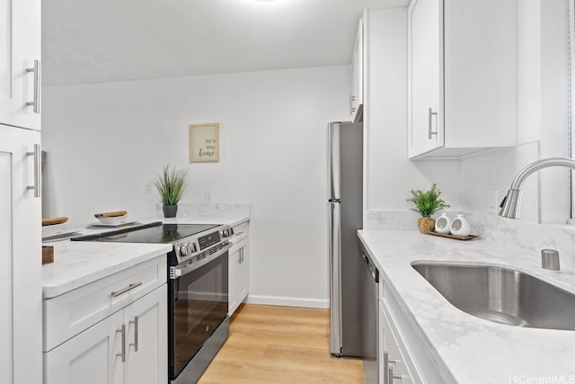 94-870 Lumiauau St Unit T203, Waipahu, HI 96797 - kitchen with stainless steel appliances, a sink, and white cabinetry