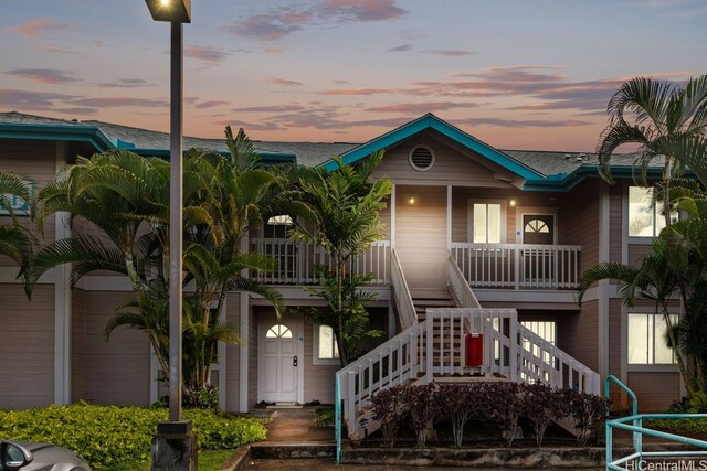 94-870 Lumiauau St Unit T203, Waipahu, HI 96797 - coastal home featuring a porch, stairs, and roof with shingles