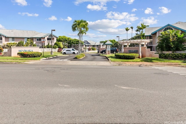 94-870 Lumiauau St Unit T203, Waipahu, HI 96797 - view of asphalt road featuring curbs, a residential view, and sidewalks