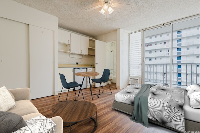 2509 Ala Wai Blvd Unit 804, Honolulu, HI 96815 - living room with a ceiling fan, a textured ceiling, and light wood-style floors