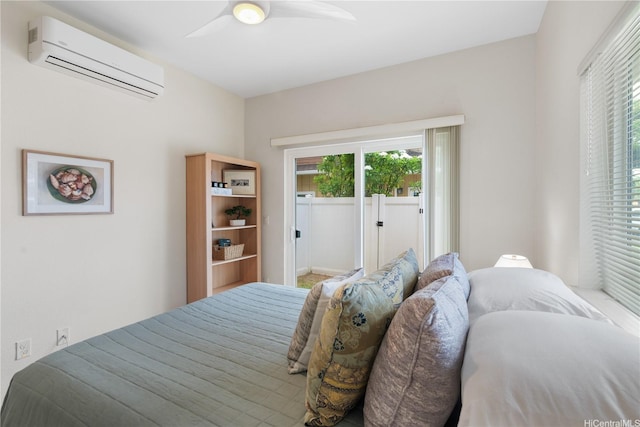 458 Manawai St Unit 512, Kapolei, HI 96707 - bedroom with a wall unit AC, multiple windows, and a ceiling fan