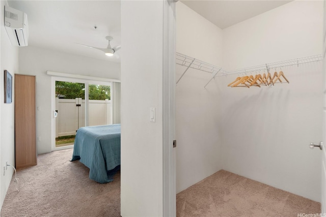458 Manawai St Unit 512, Kapolei, HI 96707 - walk in closet featuring carpet flooring, an AC wall unit, and ceiling fan