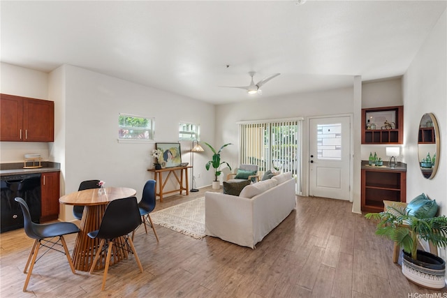 458 Manawai St Unit 512, Kapolei, HI 96707 - living area with healthy amount of natural light, light wood-style floors, and ceiling fan