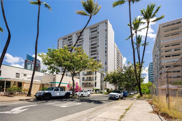 430 Keoniana St Unit 1007, Honolulu, HI 96815 - view of apartment building / complex featuring fence