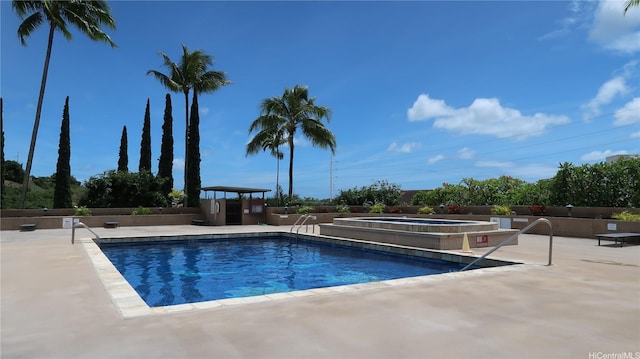 98-501 Koauka Loop Unit A1006, Aiea, HI 96701 - community pool with a hot tub and a patio
