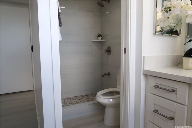 98-501 Koauka Loop Unit A1006, Aiea, HI 96701 - bathroom featuring a stall shower, toilet, and vanity