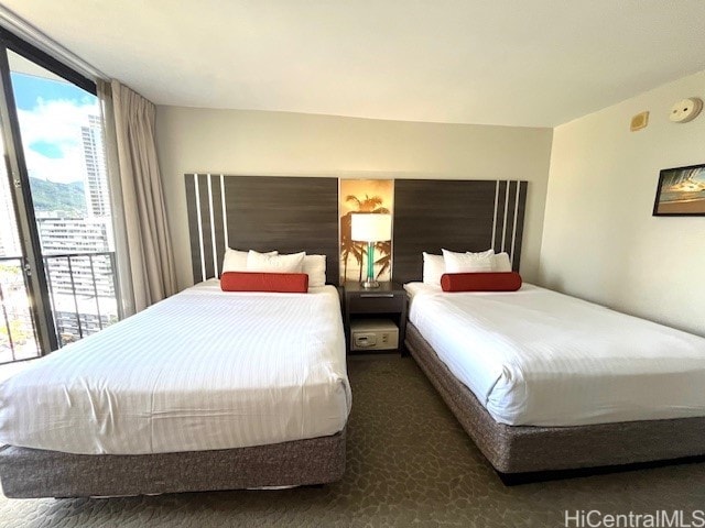 1850 Ala Moana Blvd Unit 1007, Honolulu, HI 96815 - carpeted bedroom with expansive windows