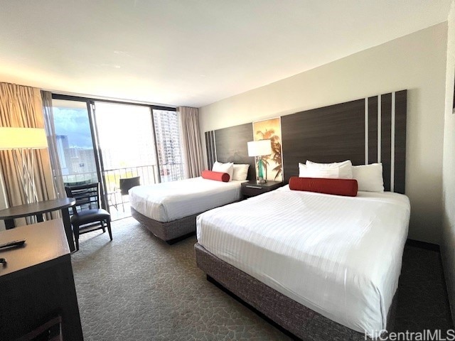 1850 Ala Moana Blvd Unit 1007, Honolulu, HI 96815 - bedroom featuring access to outside and carpet floors