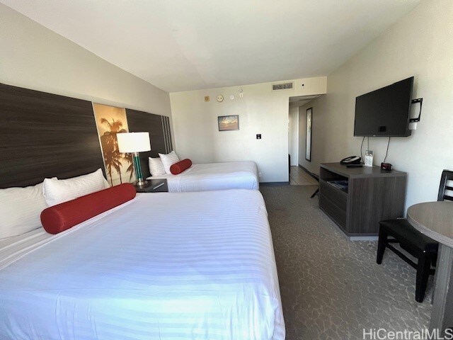 1850 Ala Moana Blvd Unit 1007, Honolulu, HI 96815 - bedroom featuring carpet flooring