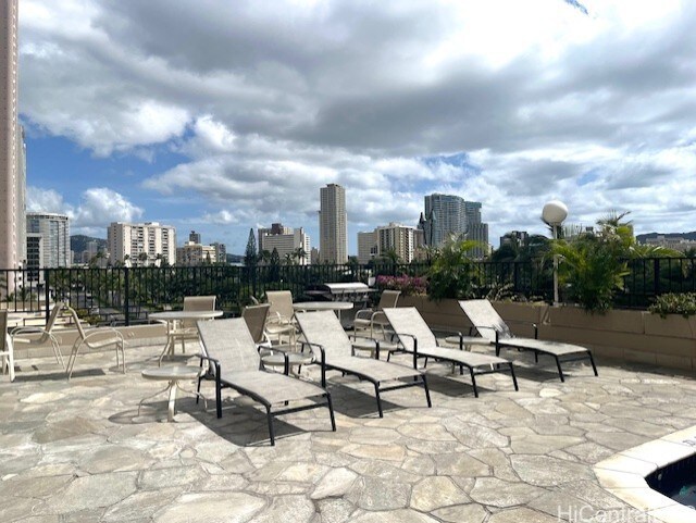 1850 Ala Moana Blvd Unit 1007, Honolulu, HI 96815 - view of patio / terrace featuring a skyline view