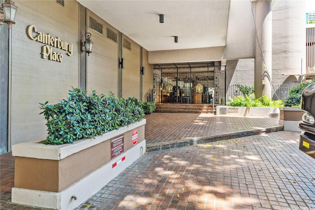 1910 Ala Moana Blvd Unit 19C, Honolulu, HI 96815 - doorway to property featuring stucco siding