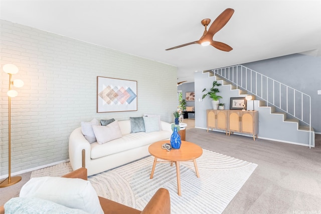 47-612 Hui Kelu St, Kaneohe, HI 96744 - carpeted living room with brick wall, a ceiling fan, and stairway