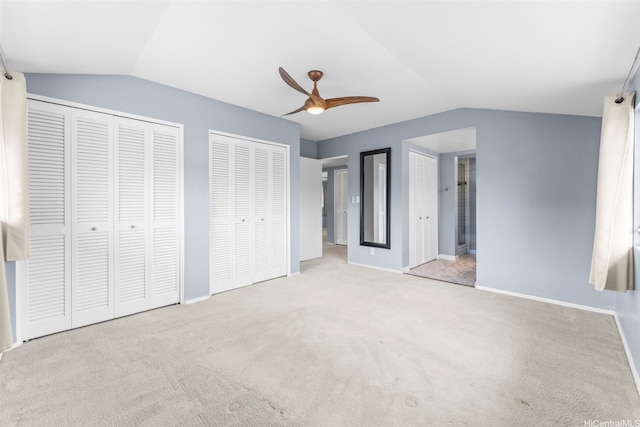 47-612 Hui Kelu St, Kaneohe, HI 96744 - unfurnished bedroom with lofted ceiling, multiple closets, carpet floors, and a ceiling fan