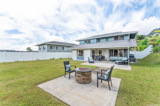 47-612 Hui Kelu St, Kaneohe, HI 96744 - back of property featuring an outdoor living space with a fire pit, a patio area, a fenced backyard, roof with shingles, and stucco siding