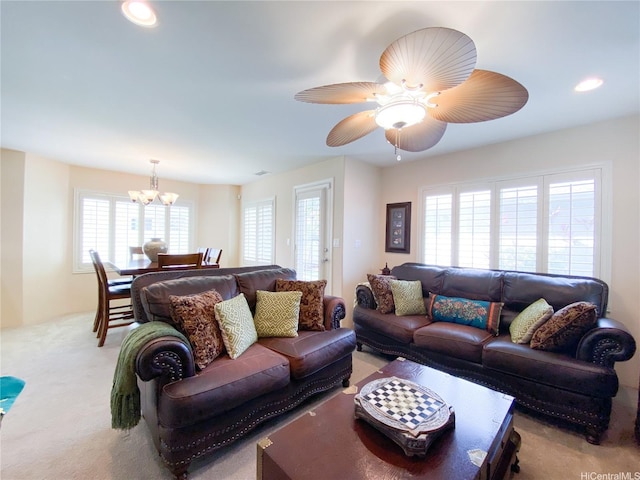 91-1775 Waiaama St, Ewa Beach, HI 96706 - living room with a chandelier, light colored carpet, plenty of natural light, a ceiling fan, and recessed lighting