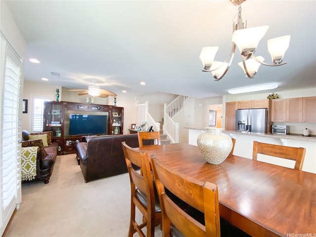 91-1775 Waiaama St, Ewa Beach, HI 96706 - dining space featuring a chandelier, stairs, ceiling fan, light carpet, and recessed lighting
