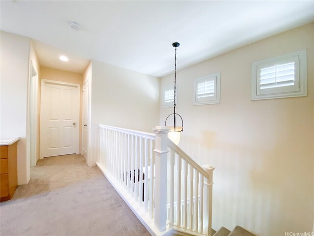 91-1775 Waiaama St, Ewa Beach, HI 96706 - hall with an upstairs landing, light carpet, and recessed lighting