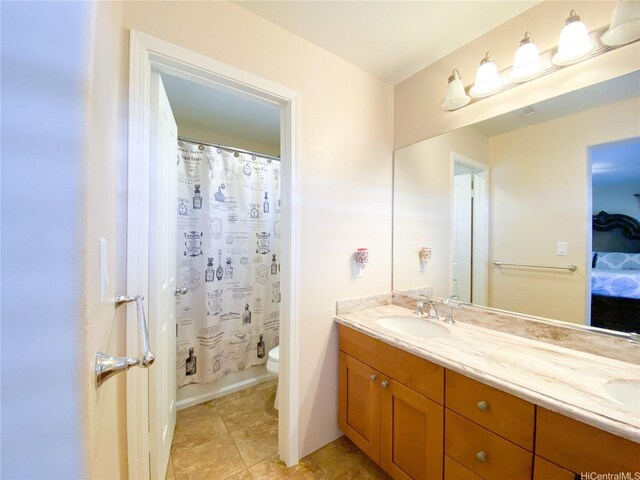 91-1775 Waiaama St, Ewa Beach, HI 96706 - full bathroom with double vanity, toilet, and curtained shower