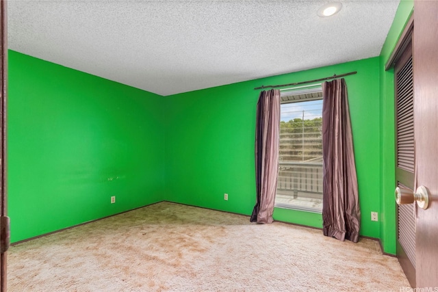 94-046 Puanane Pl, Mililani, HI 96789 - unfurnished room with carpet and a textured ceiling