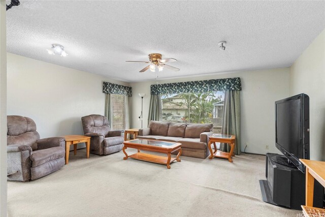 94-046 Puanane Pl, Mililani, HI 96789 - living room featuring light colored carpet, a ceiling fan, and a textured ceiling