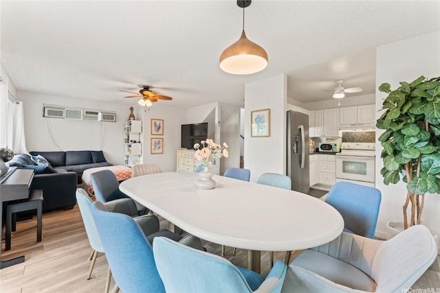 2290 Akepa St, Pearl City, HI 96782 - dining room with a ceiling fan and light wood-style floors