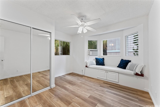 2290 Akepa St, Pearl City, HI 96782 - unfurnished room with ceiling fan, light wood-type flooring, a textured ceiling, baseboards, and cooling unit