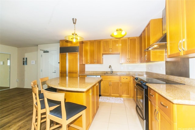 1296 Kapiolani Blvd Unit 3805, Honolulu, HI 96814 - kitchen with stainless steel appliances, a sink, a kitchen island, a breakfast bar, and exhaust hood