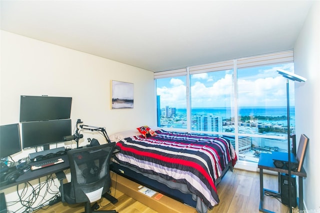1296 Kapiolani Blvd Unit 3805, Honolulu, HI 96814 - bedroom with a wall of windows, wood finished floors, a city view, and a water view
