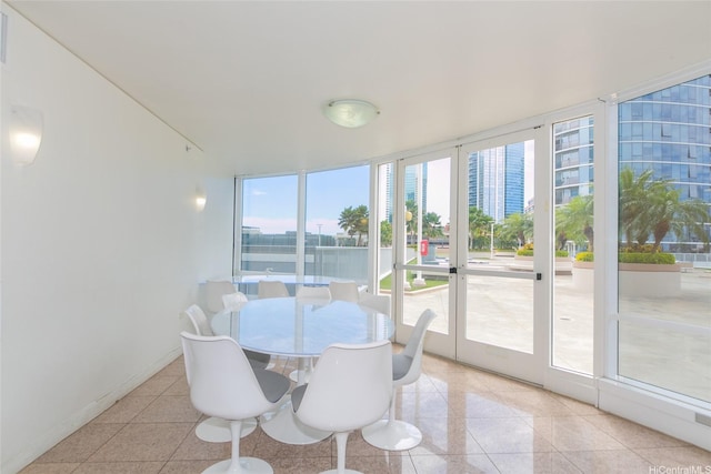 1296 Kapiolani Blvd Unit 3805, Honolulu, HI 96814 - sunroom with a wall of windows and tile patterned flooring