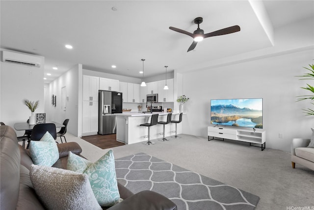 94-1188 Kalahikiola Dr Unit 1004, Waipahu, HI 96797 - living area featuring a wall mounted AC, dark colored carpet, ceiling fan, and recessed lighting