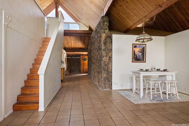 337 Wanaao Rd, Kailua, HI 96734 - tiled foyer entrance featuring wooden ceiling with exposed beams, a chandelier, high vaulted ceiling, and stairs