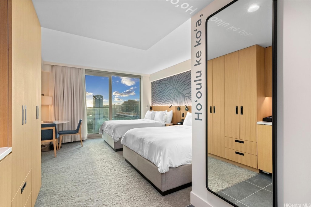 1390 Kapiolani Blvd Unit 3107, Honolulu, HI 96814 - bedroom with access to outside and light colored carpet