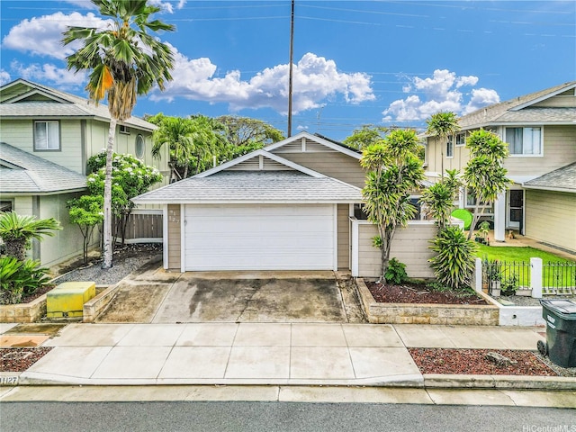 91-127 Puaina Pl, Ewa Beach, HI 96706 - view of front of house with driveway and an attached garage