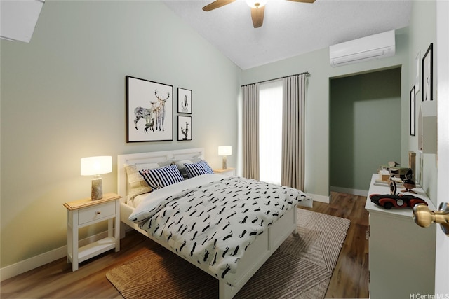 91-127 Puaina Pl, Ewa Beach, HI 96706 - bedroom featuring an AC wall unit, lofted ceiling, wood finished floors, baseboards, and a ceiling fan