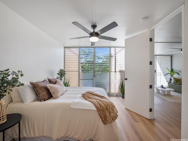 95-65 Waikalani Dr Unit F302, Mililani, HI 96789 - bedroom with light wood-style floors and a ceiling fan